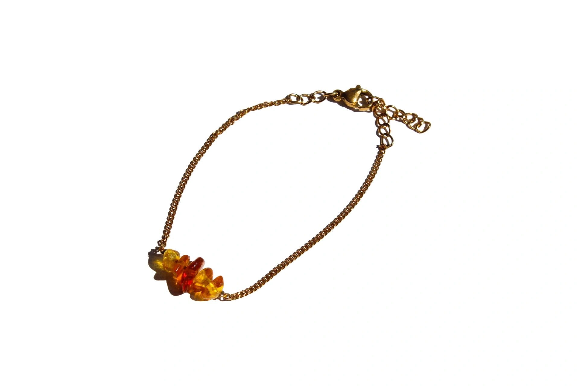 pulseira-theia-dourada-ambar-whisky (1) pulseira theia dourada ambar whisky 1