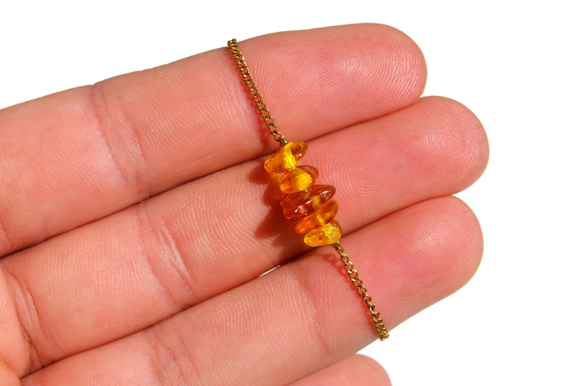 pulseira-theia-dourada-ambar-whisky (2) pulseira theia dourada ambar whisky 2