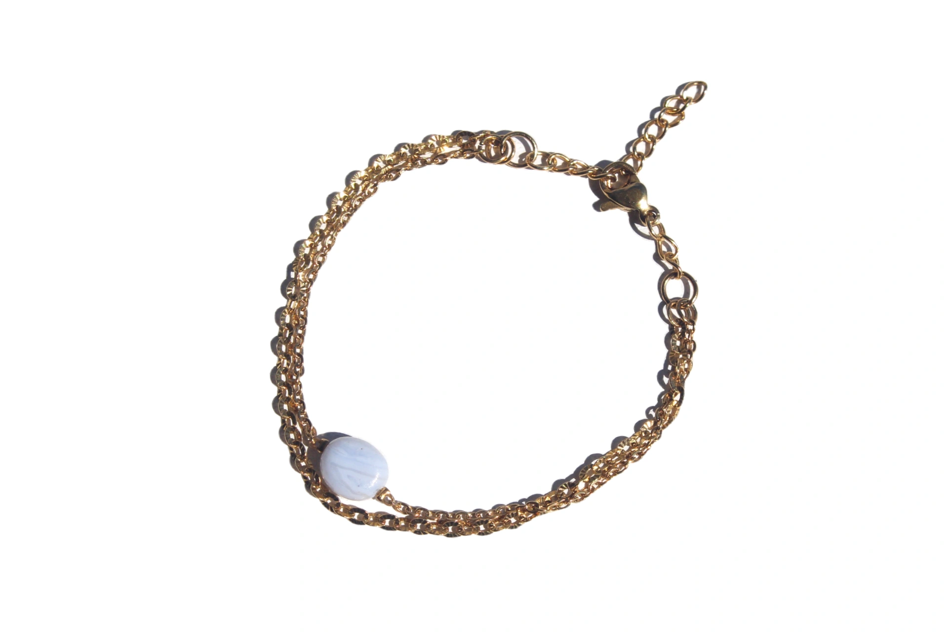 pulseira-circe-ágata-azul-rendilhada-dourada (1) pulseira circe agata azul rendilhada dourada 1