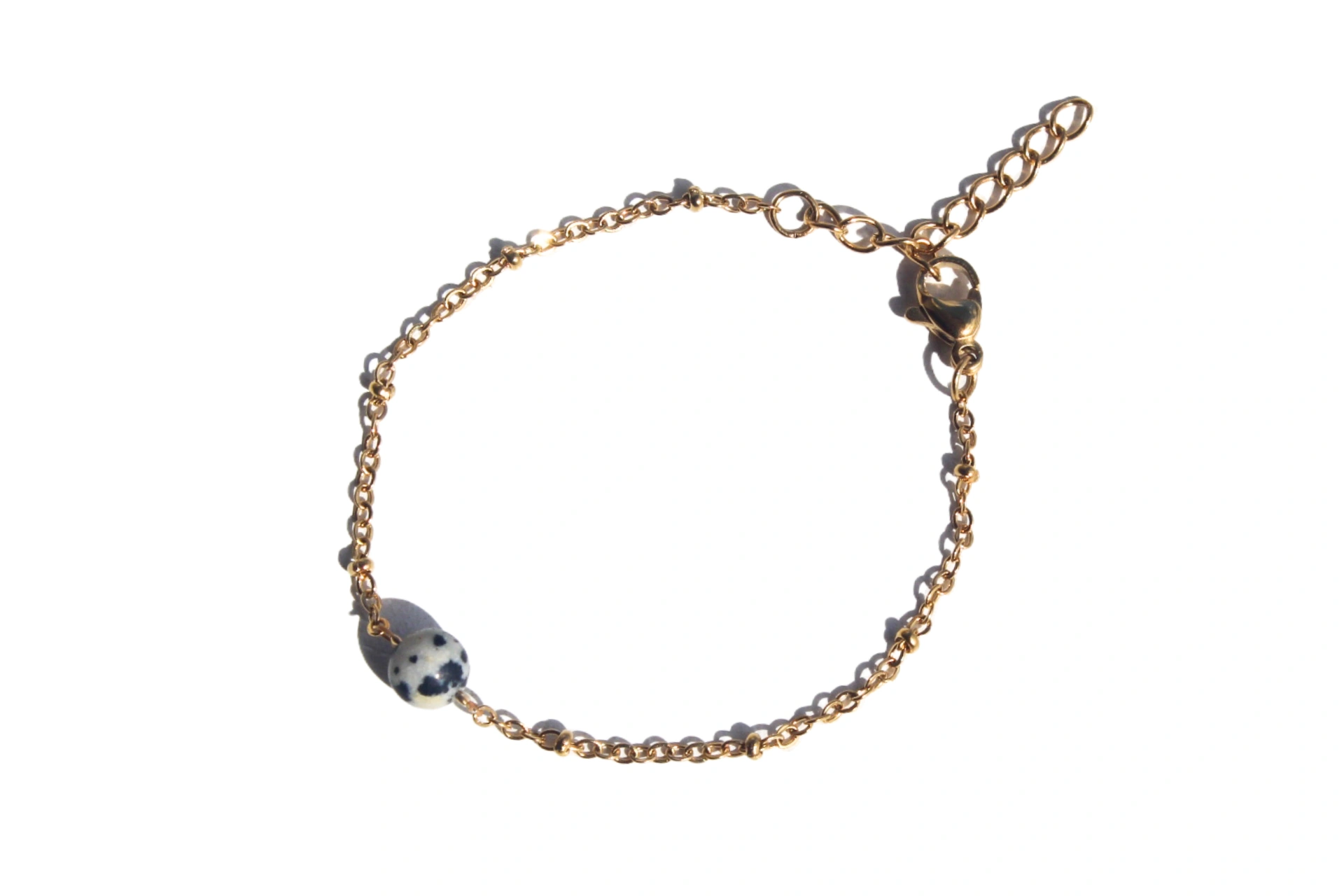 pulseira-aedos-jaspe-dalmata-dourada (1) pulseira aedos jaspe dalmata dourada 1